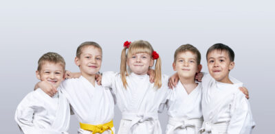 Cheerful children in karategi